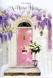 A pastel Barking doorway glows with the tenderness of a new chapter, the scene composed with the care of a local florist marking a special move-in day. A softly painted pink front door stands at the centre, its slightly weathered finish giving a sense of character and lived-in charm, framed by white walls that catch the afternoon sun in a warm, diffused light. Overhead, trailing wisteria spills in abundant lavender strands, each cluster of blossoms forming a gentle curtain that drapes around the doorway, reminiscent of the romantic greenery you might see climbing over older homes off Longbridge Road or near Barking Park. At the doorstep, a vintage-style grey bucket has been placed purposefully against the wall, brimming with full-headed white and cream roses so plush they almost seem to sigh open. Delicate green foliage peeks between the blooms, adding texture and movement as if freshly gathered from a nearby garden. A soft pink ribbon is tied around the bucket, its satin bow and flowing tails repeating the door's rosy tones and tying the entire palette together. Light and shadow play quietly across the stone step, hinting at a calm, late-afternoon moment when a housewarming delivery has just arrived. The atmosphere feels intimate and hopeful, as though the flowers have been chosen to soothe the busyness of moving and to bless this Barking home with comfort, beauty, and good fortune. Every petal, vine, and brushstroke of colour works together to express welcome, gratitude, and the gentle thrill of beginning again in a place of your own.